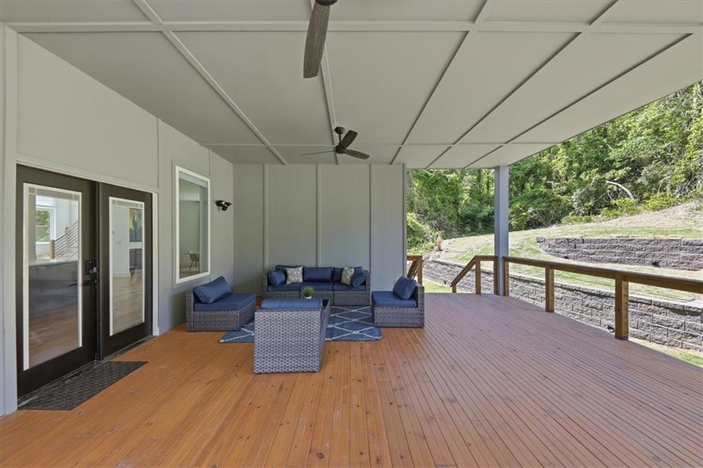4107 Danforth Road Southwest Atlanta, GA 30331 - Photo 52 of 64 a living room with patio furniture and a floor to ceiling window