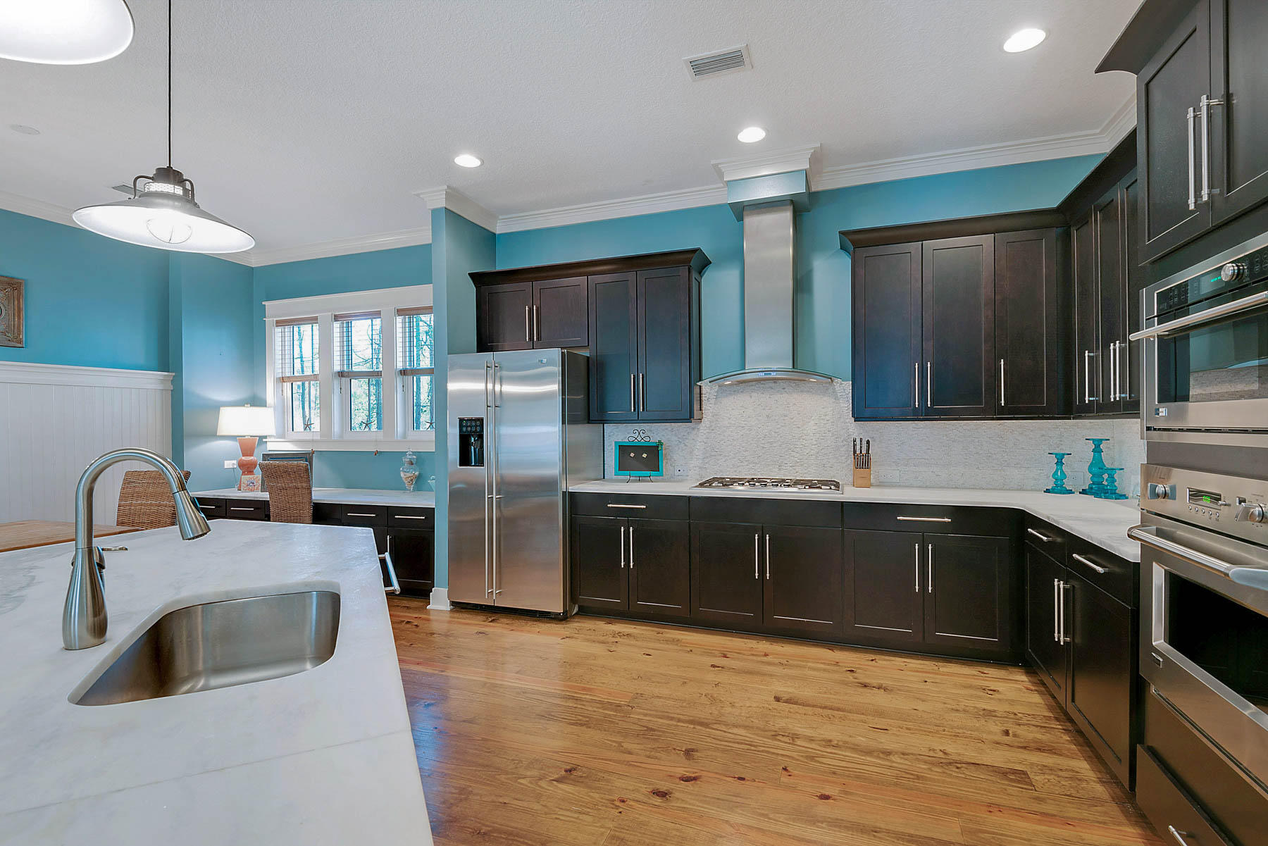 379 East Royal Fern Way Santa Rosa Beach, FL 32459 - Photo 23 of 53 a kitchen with stainless steel appliances granite countertop a sink stove and refrigerator