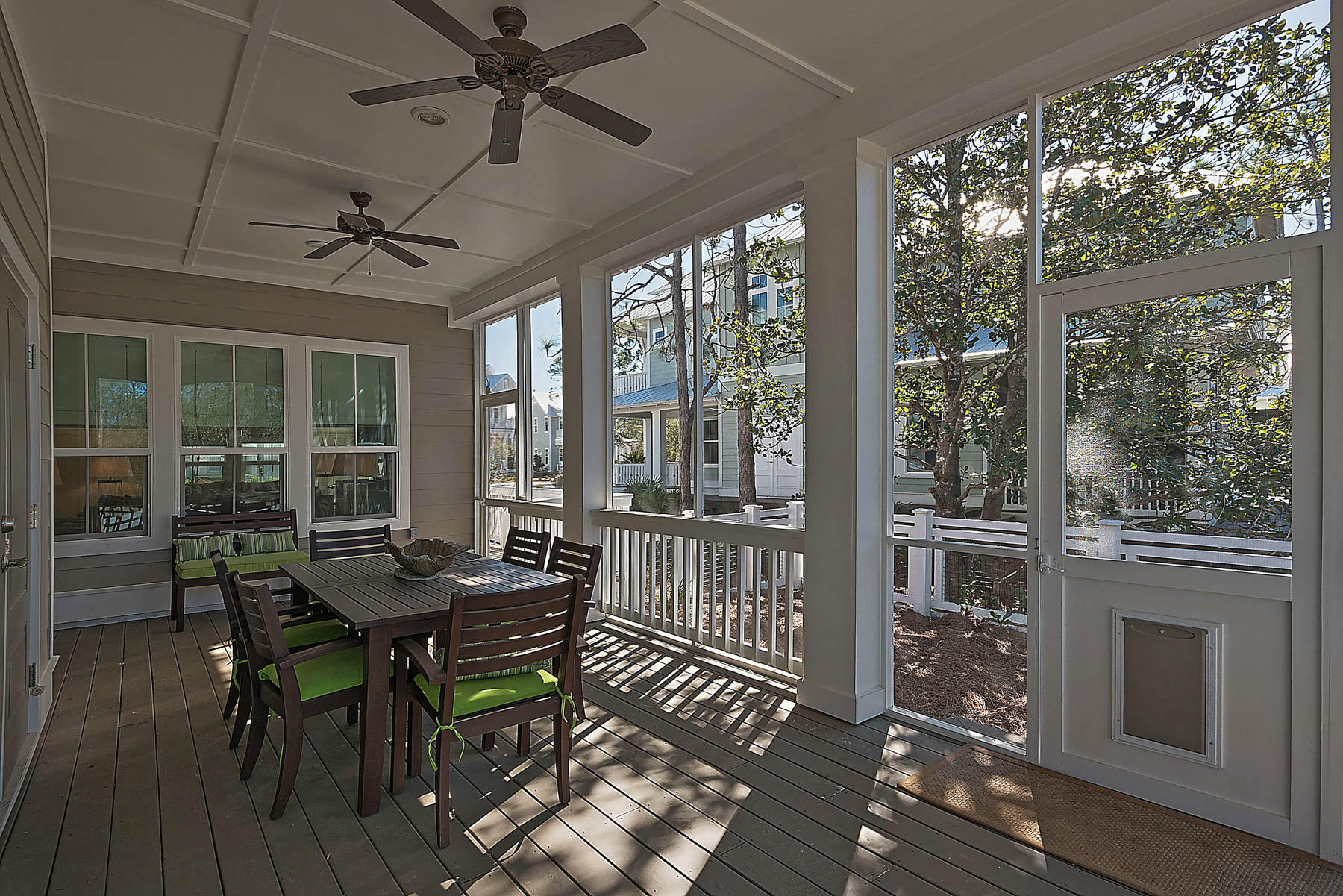 379 East Royal Fern Way Santa Rosa Beach, FL 32459 - Photo 26 of 53 a dining room with furniture a chandelier and wooden floor