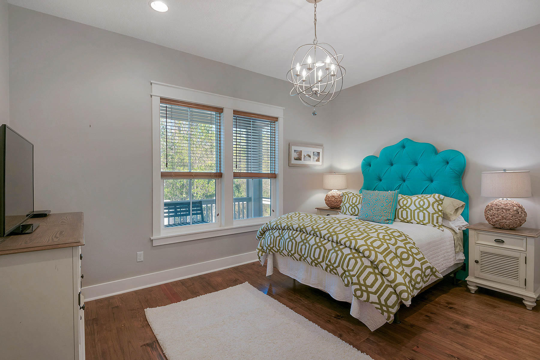 379 East Royal Fern Way Santa Rosa Beach, FL 32459 - Photo 31 of 53 a bedroom with a bed chandelier and window