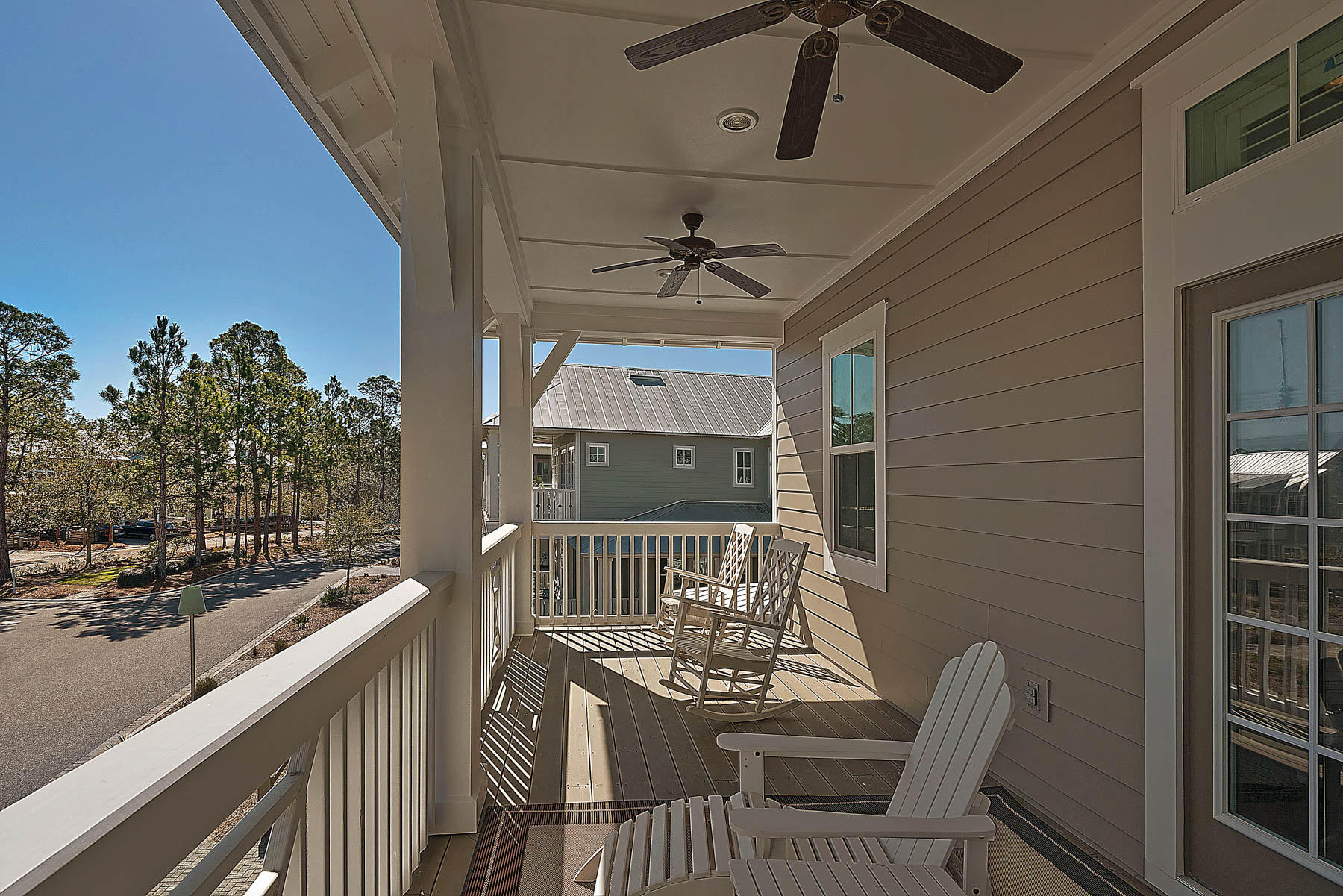 379 East Royal Fern Way Santa Rosa Beach, FL 32459 - Photo 38 of 53 a view of a chairs and table on the balcony