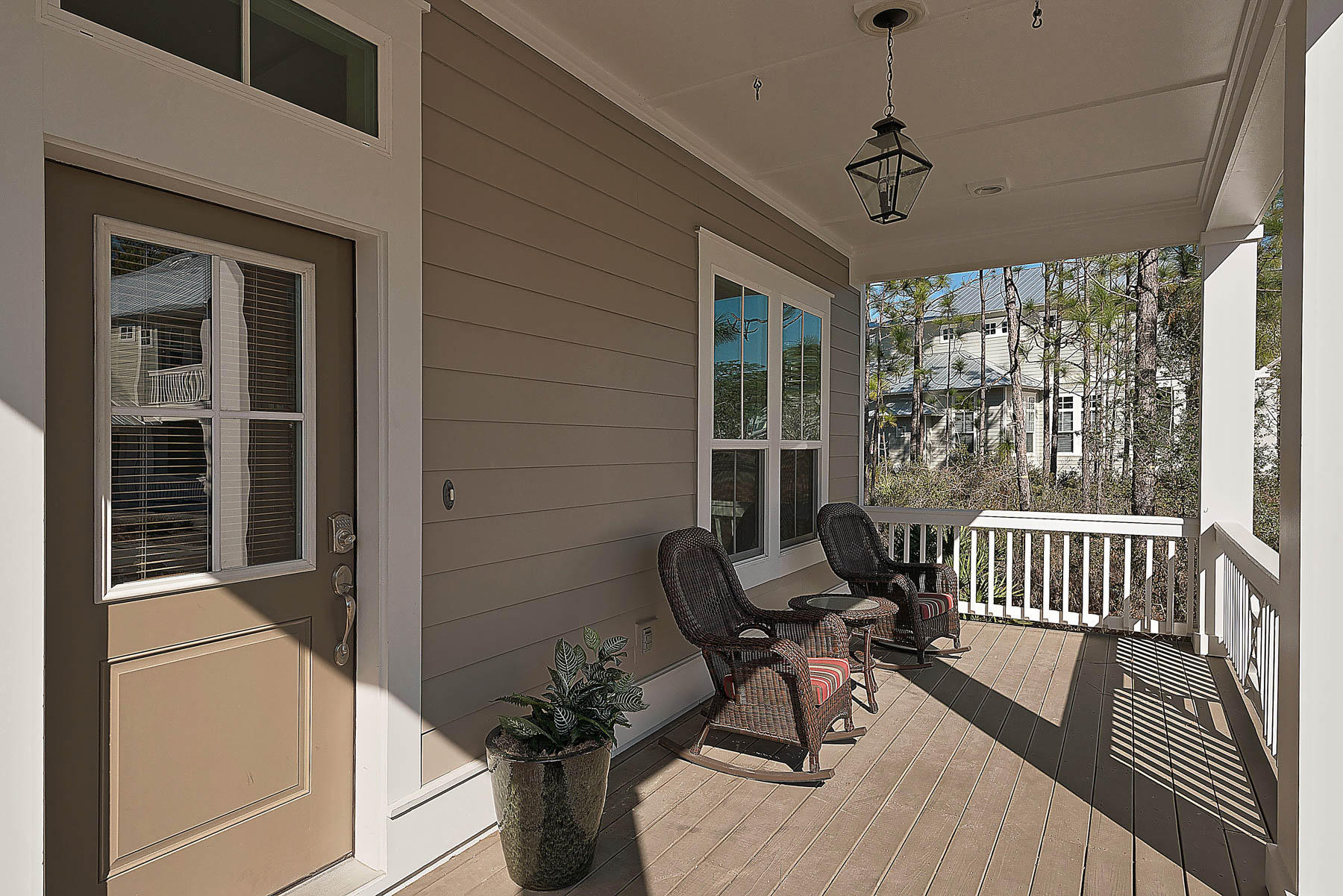 379 East Royal Fern Way Santa Rosa Beach, FL 32459 - Photo 5 of 53 a view of a porch with furniture and a window