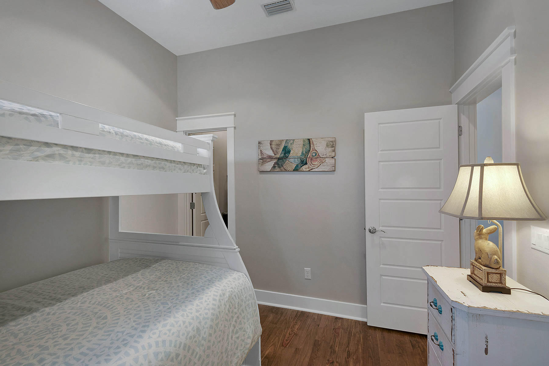 379 East Royal Fern Way Santa Rosa Beach, FL 32459 - Photo 45 of 53 a bedroom with a bed and a lamp