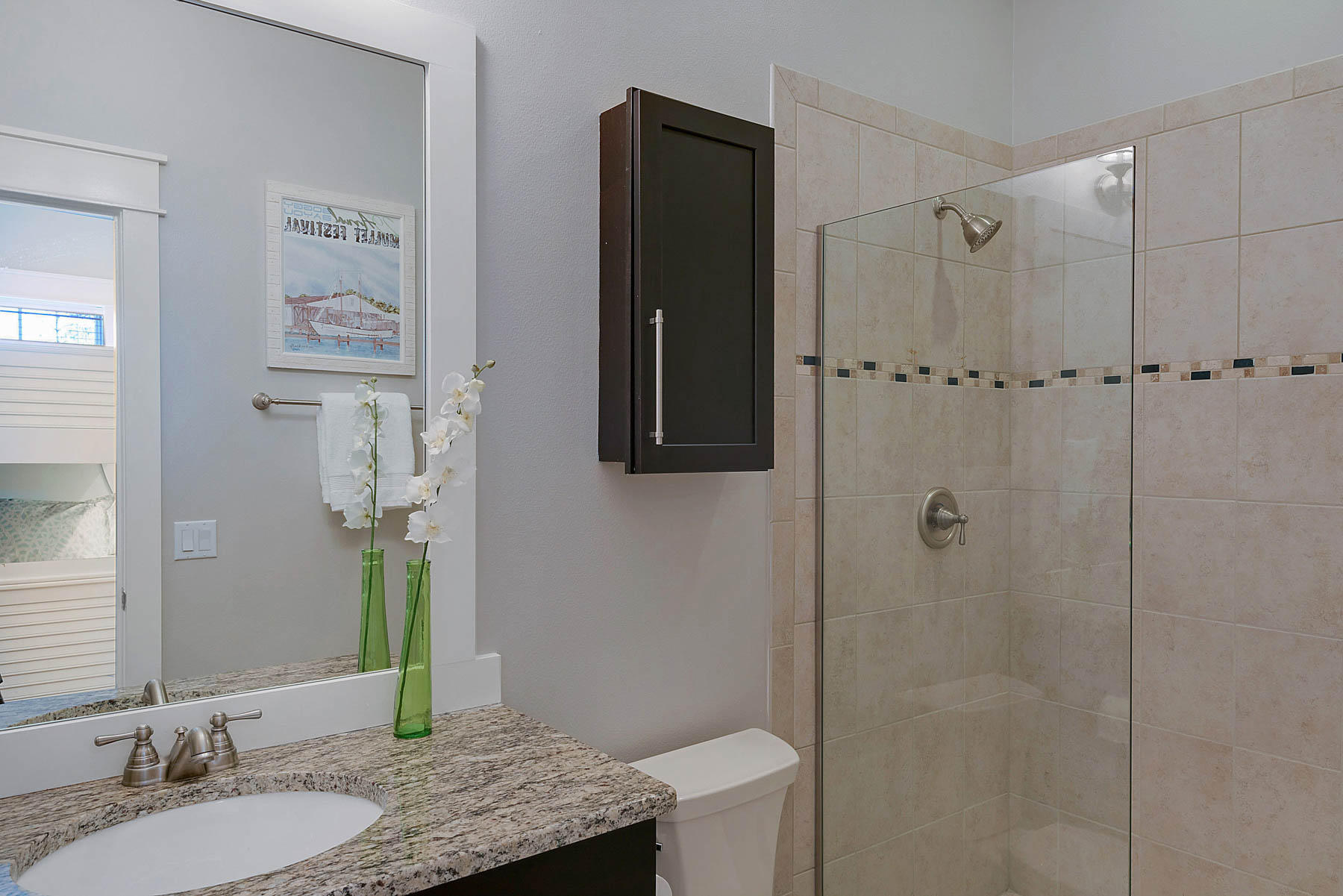 379 East Royal Fern Way Santa Rosa Beach, FL 32459 - Photo 46 of 53 a bathroom with a granite countertop sink a mirror and shower