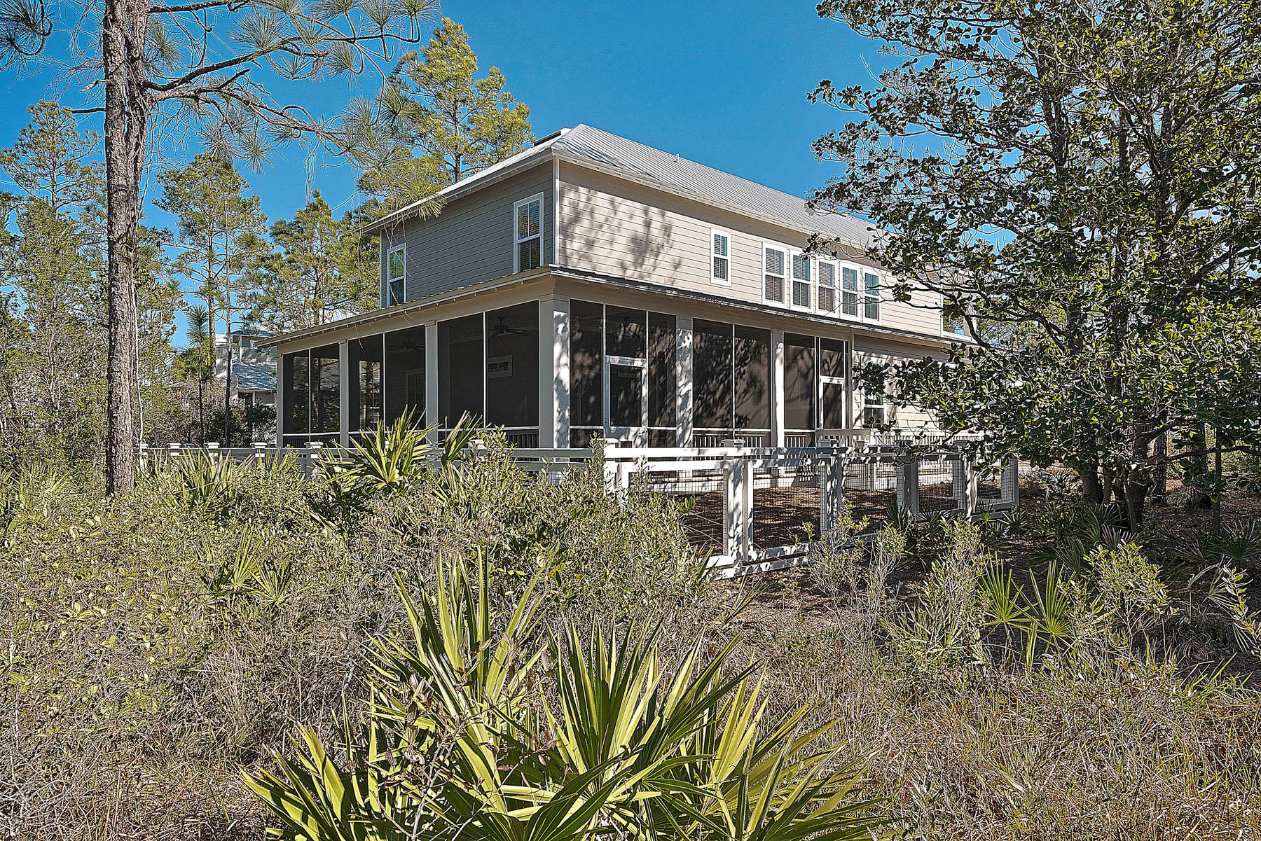 379 East Royal Fern Way Santa Rosa Beach, FL 32459 - Photo 8 of 53 a front view of a house with a yard
