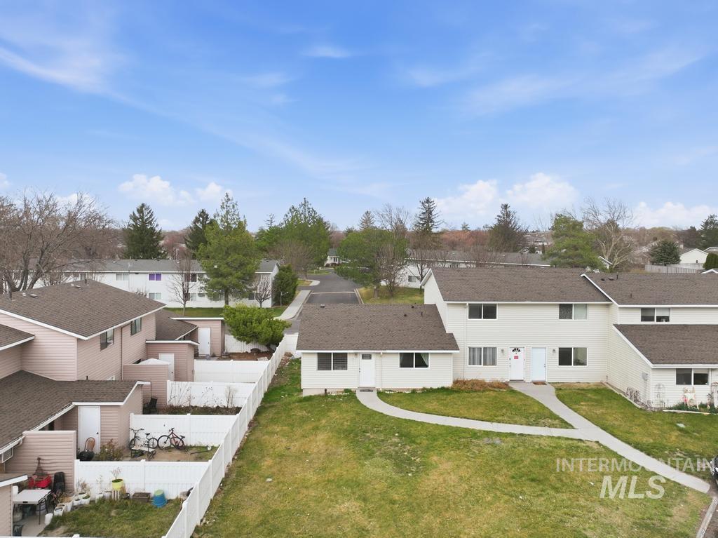259 Pheasant Road West, Unit 25 Twin Falls, ID 83301 - Photo 1 of 1 Aerial perspective of suburban area