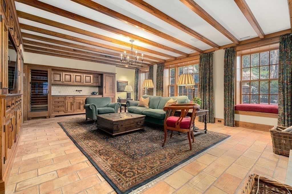 14 Old Orchard Road Newton, MA 02467 - Photo 17 of 34 a living room with furniture and a fireplace