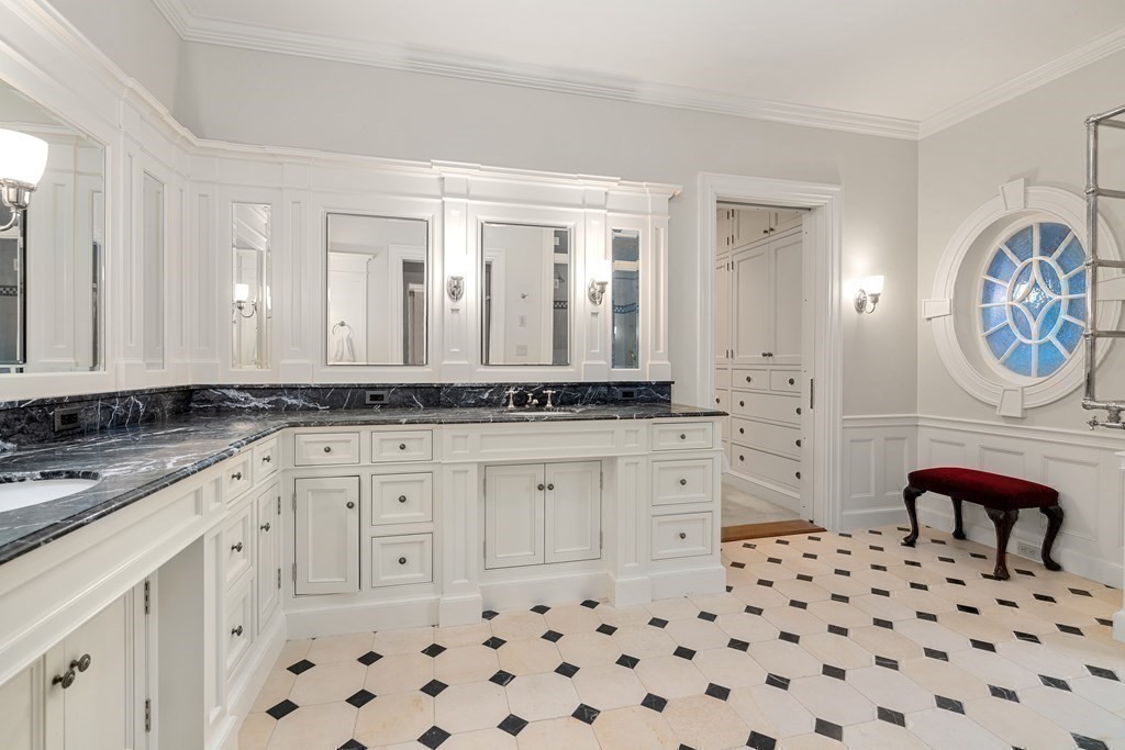 14 Old Orchard Road Newton, MA 02467 - Photo 21 of 34 a bathroom with a sink a vanity and a mirror