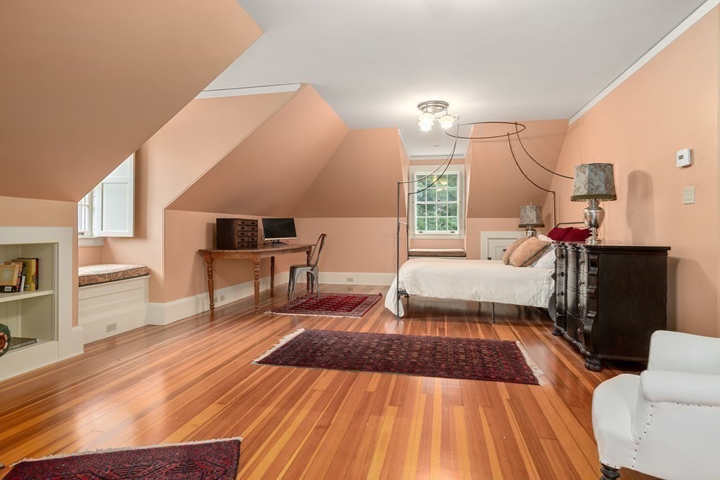 14 Old Orchard Road Newton, MA 02467 - Photo 24 of 34 a spacious bedroom with a bed and a view of living room
