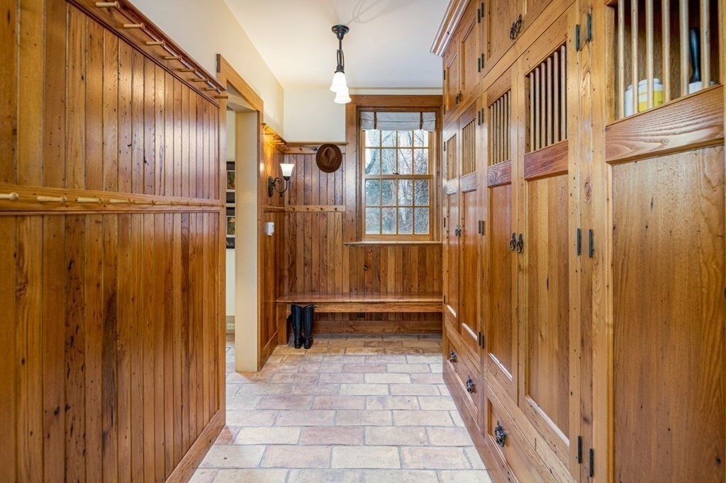 14 Old Orchard Road Newton, MA 02467 - Photo 25 of 34 a view of a hallway with wooden shelves