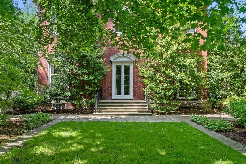14 Old Orchard Road Newton, MA 02467 - Photo 29 of 34 a front view of a house with a garden