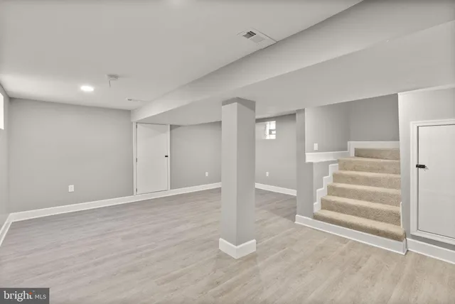 a bathroom with a toilet and a sink