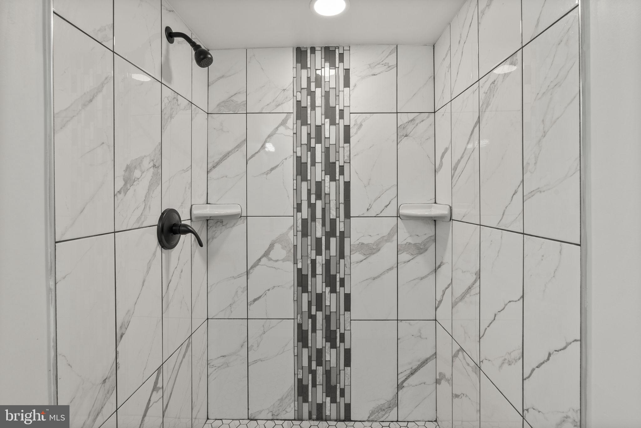 3417 Springdale Avenue Baltimore, MD 21216 - Photo 25 of 60 a bathroom with a shower