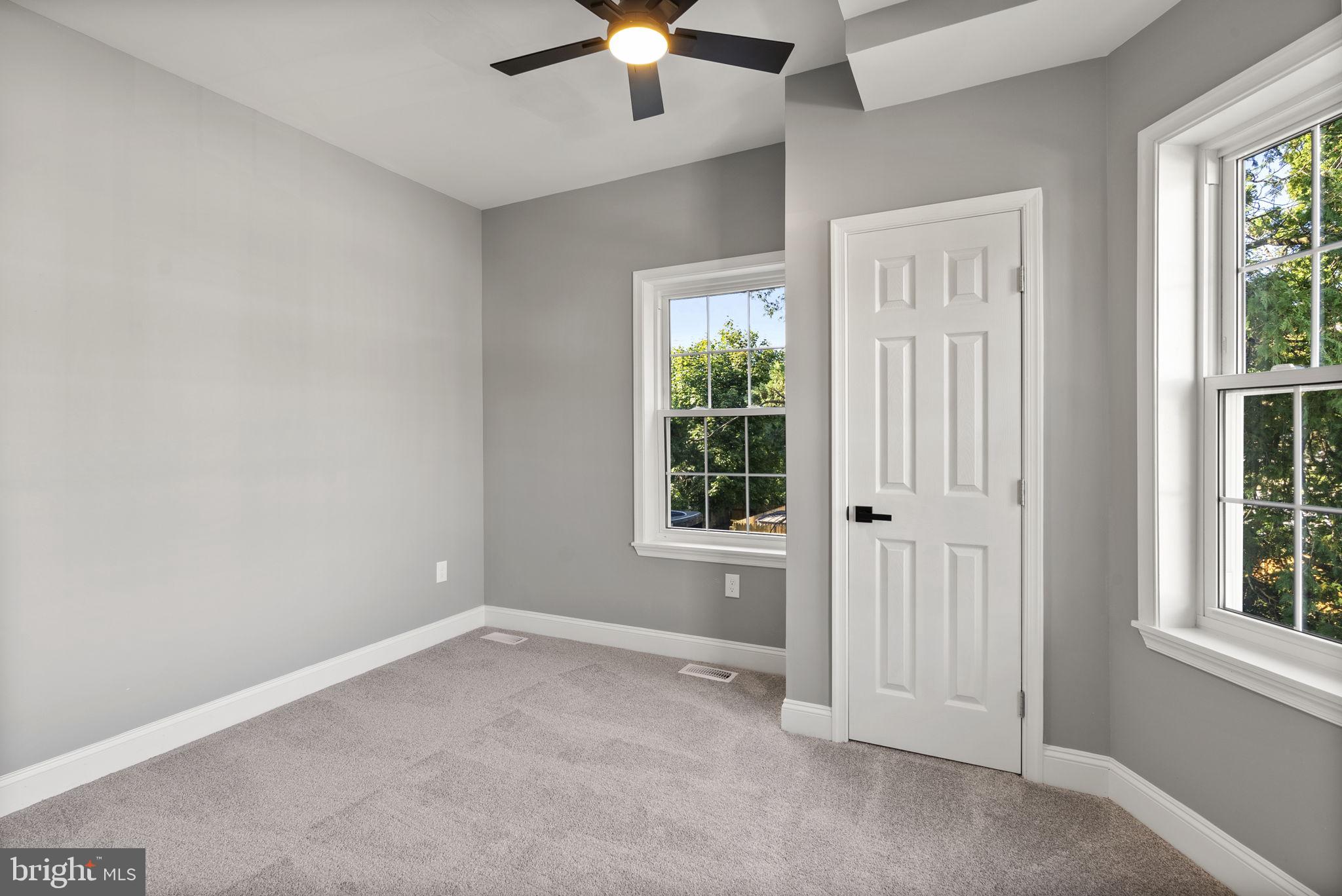 3417 Springdale Avenue Baltimore, MD 21216 - Photo 26 of 60 an empty room with windows and closet