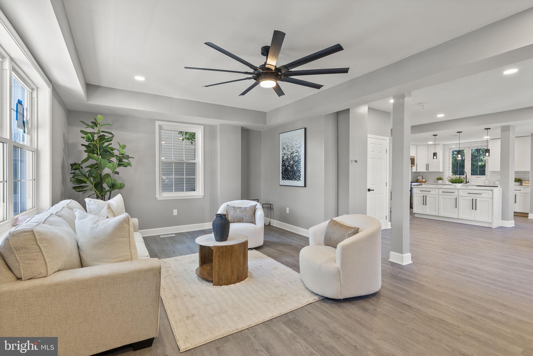 3417 Springdale Avenue Baltimore, MD 21216 - Photo 4 of 60 a living room with furniture and a large window