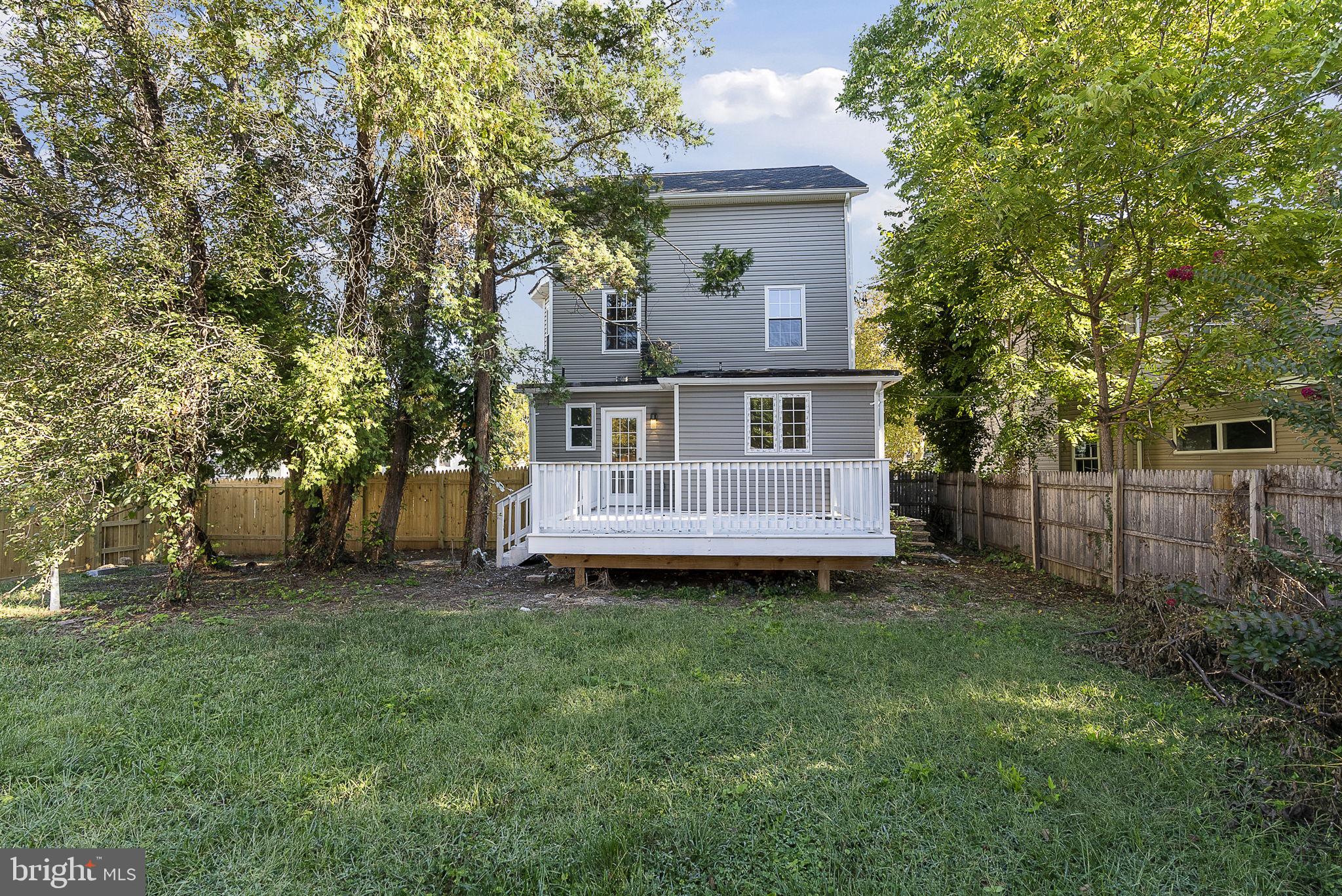 3417 Springdale Avenue Baltimore, MD 21216 - Photo 57 of 60 a view of a house with a yard