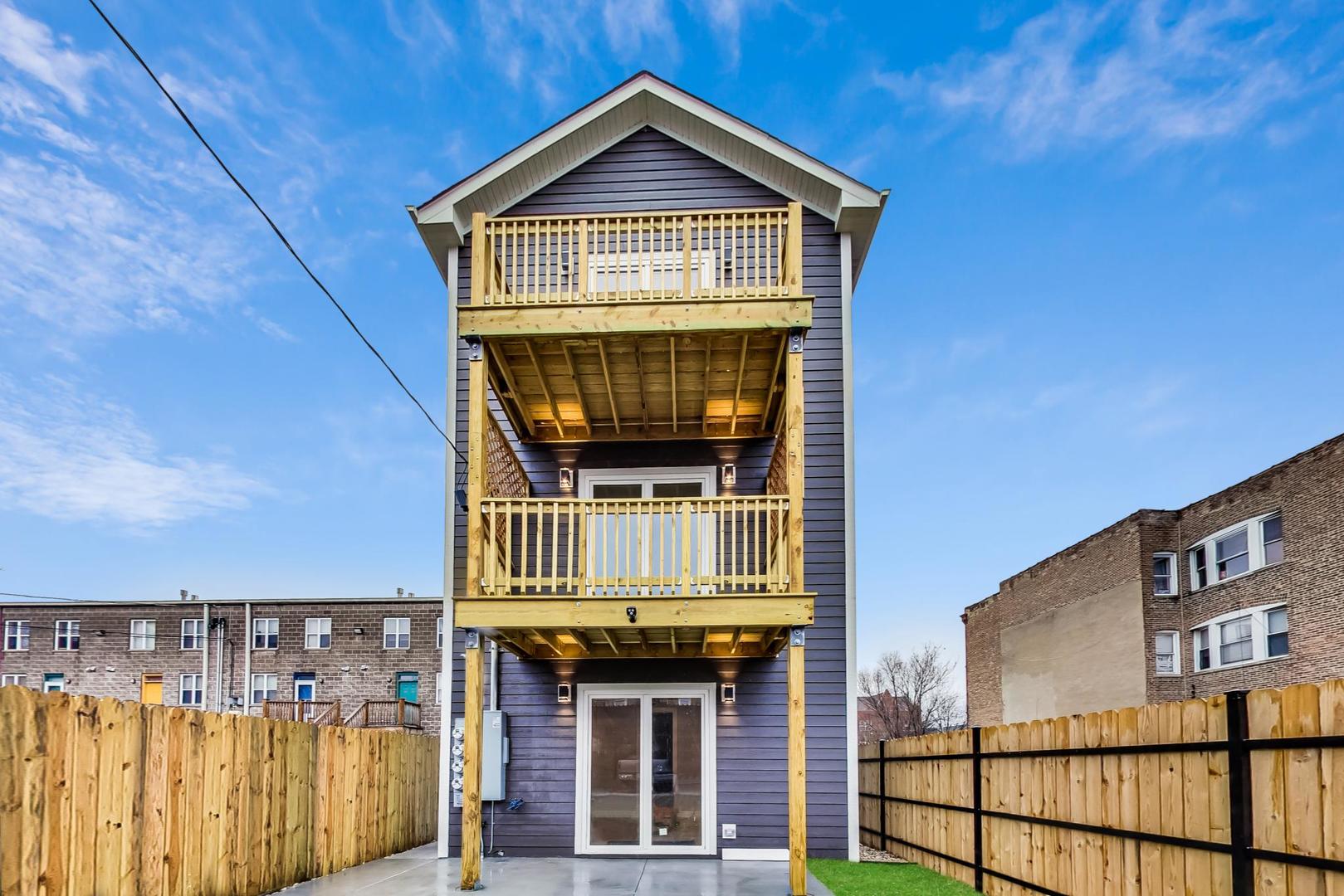 4745 South Indiana Avenue, Unit 3 Chicago, IL 60615 - Photo 13 of 42 a front view of a house with a door