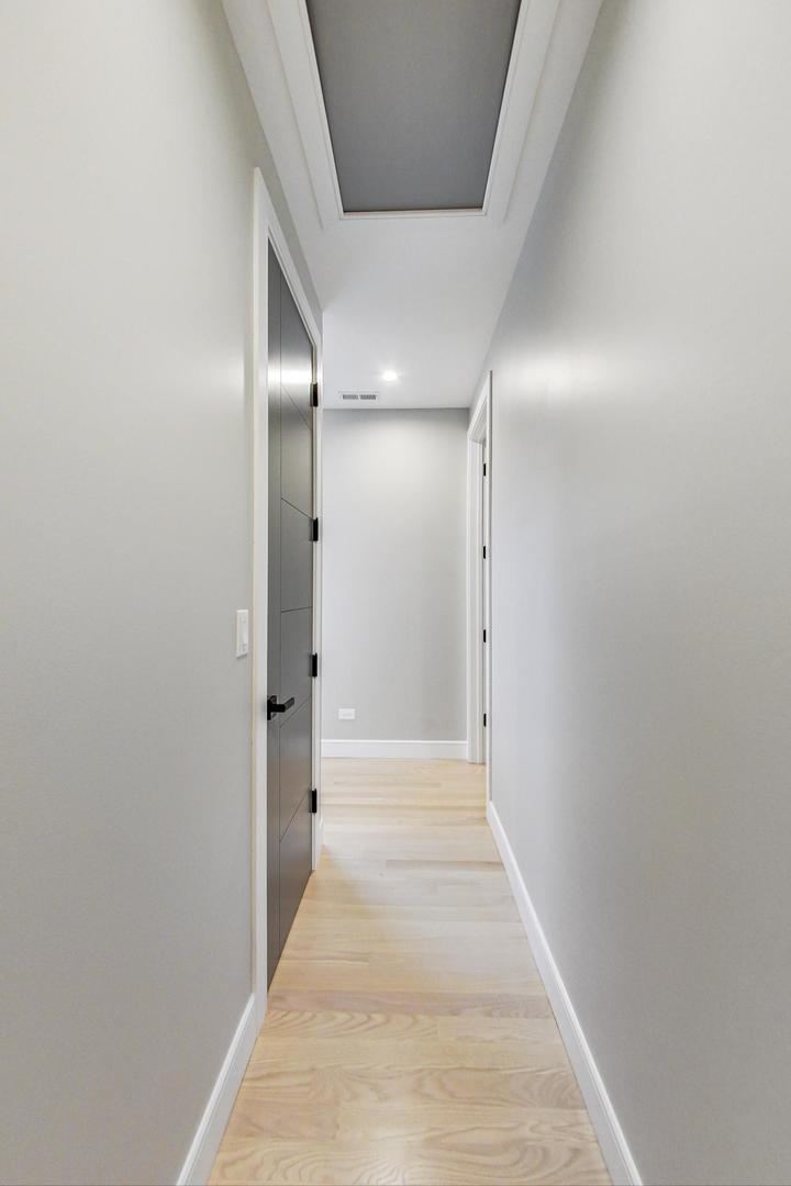 4745 South Indiana Avenue, Unit 3 Chicago, IL 60615 - Photo 24 of 42 a view of a hallway