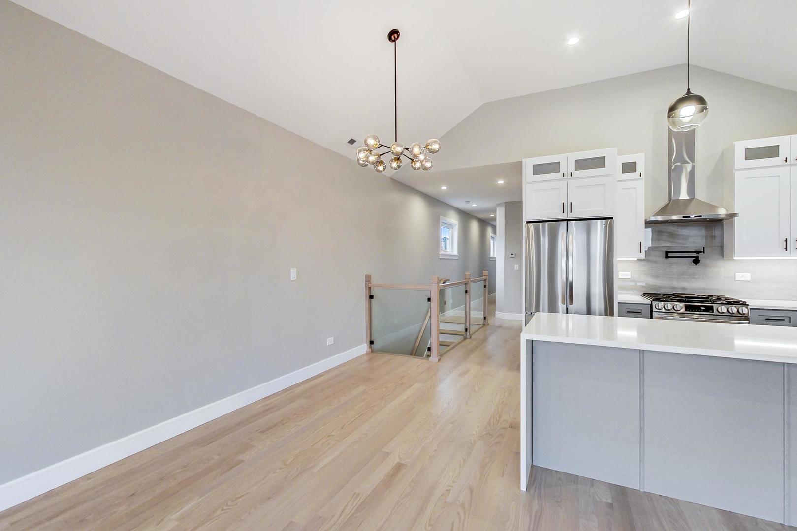 4745 South Indiana Avenue, Unit 3 Chicago, IL 60615 - Photo 30 of 42 a very nice looking room with a ceiling fan
