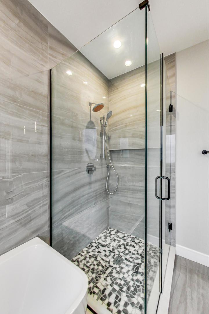 4745 South Indiana Avenue, Unit 3 Chicago, IL 60615 - Photo 40 of 42 a bathroom with a shower and a sink