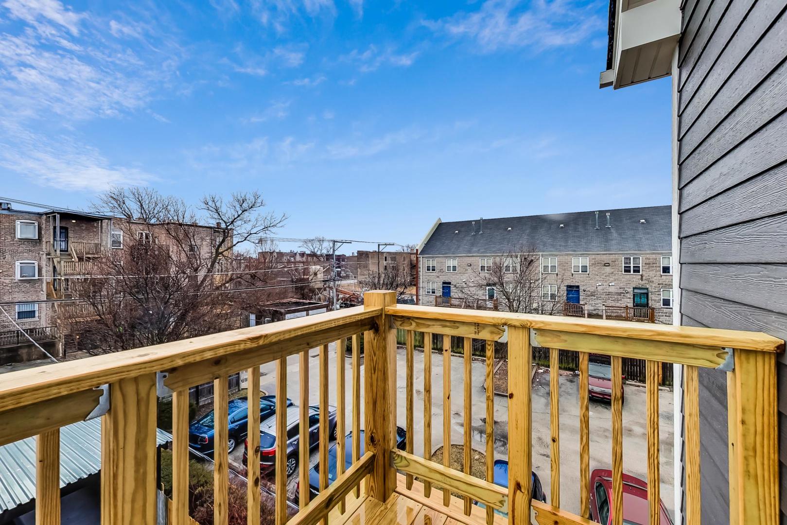 4745 South Indiana Avenue, Unit 3 Chicago, IL 60615 - Photo 42 of 42 a view of a balcony with furniture