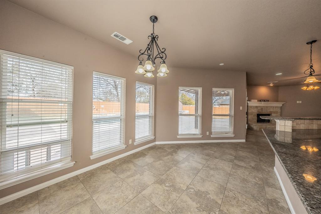 405 Edgewood Terrace Boyd, TX 76023 - Photo 13 of 39 Room to gather around the table