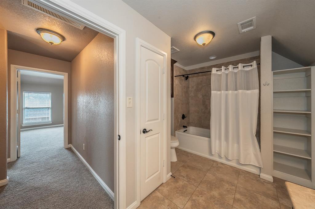 405 Edgewood Terrace Boyd, TX 76023 - Photo 25 of 39 Upstairs bath--yes it has that much room and storage
