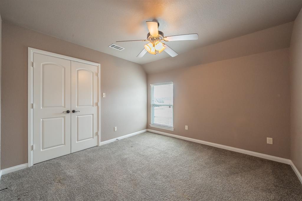 405 Edgewood Terrace Boyd, TX 76023 - Photo 28 of 39 a view of an empty room with a window