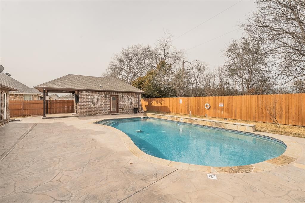 405 Edgewood Terrace Boyd, TX 76023 - Photo 33 of 39 a view of a swimming pool and a yard
