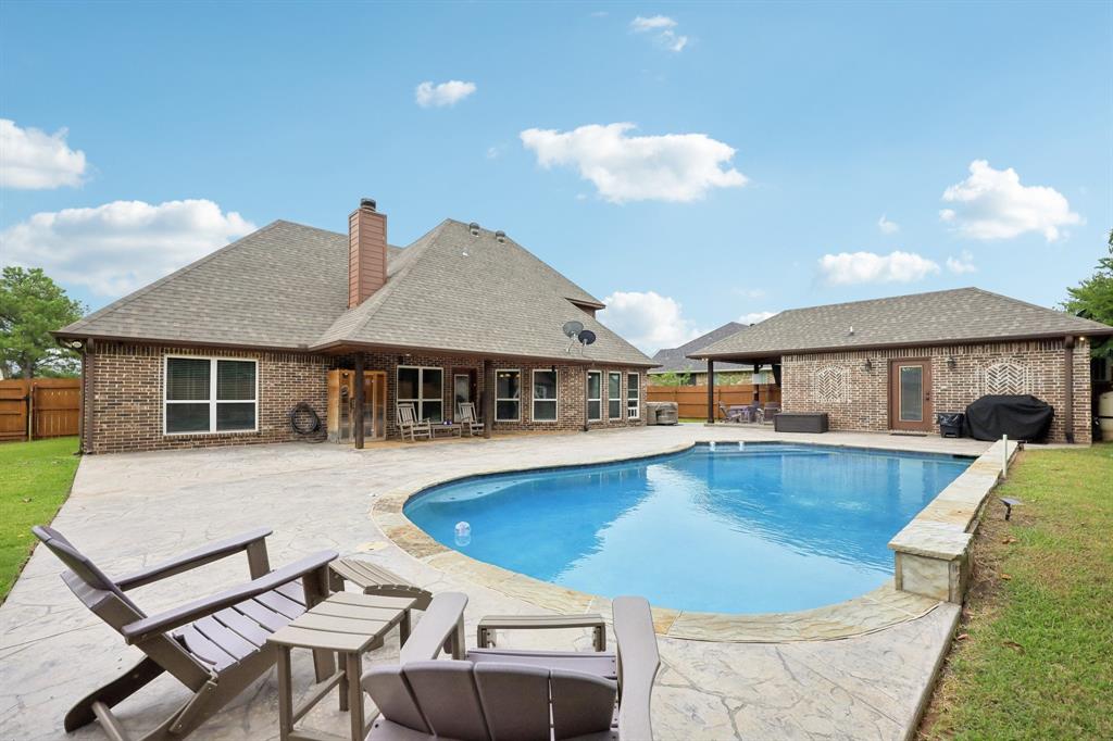 405 Edgewood Terrace Boyd, TX 76023 - Photo 39 of 39 a view of a house with swimming pool and sitting area