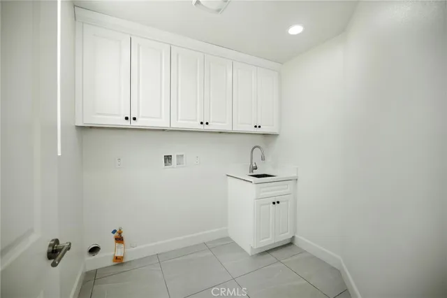 a view of cabinets with washer dryer