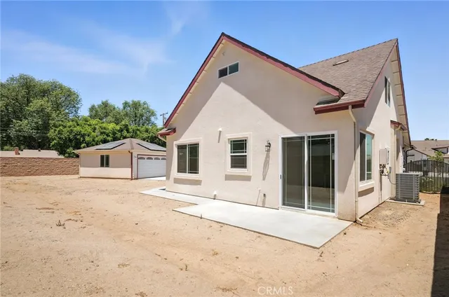 front view of a house with a street