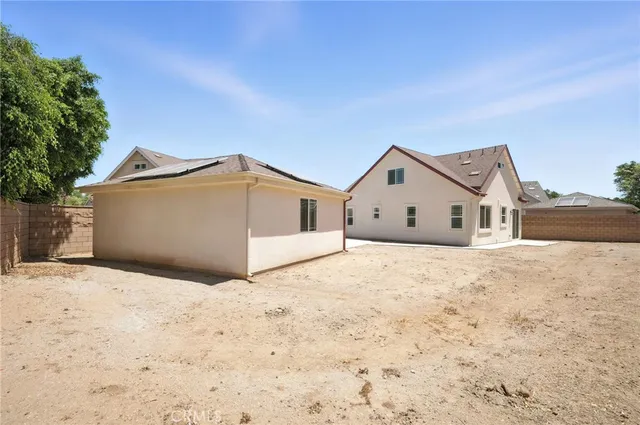 a view of garage and yard