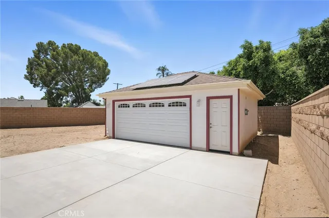a front view of a house with a garage