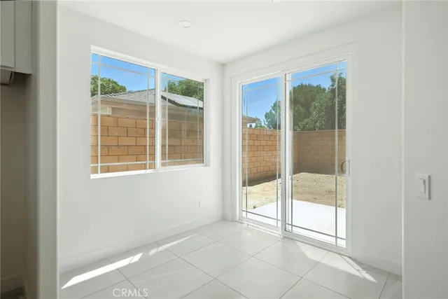 a view of a room that has a window in it