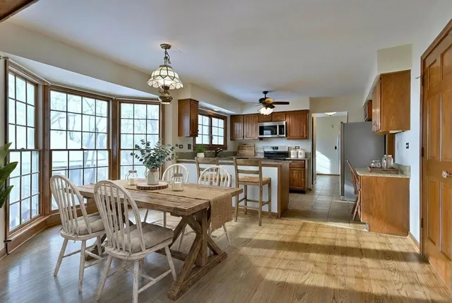 wooden floor in an empty room with a fireplace