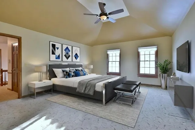 a bathroom with a double vanity sink mirror and shower
