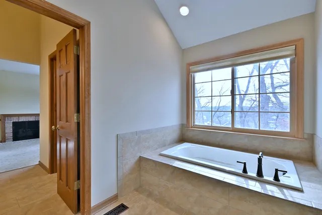 a bathroom with a sink a vanity and a mirror