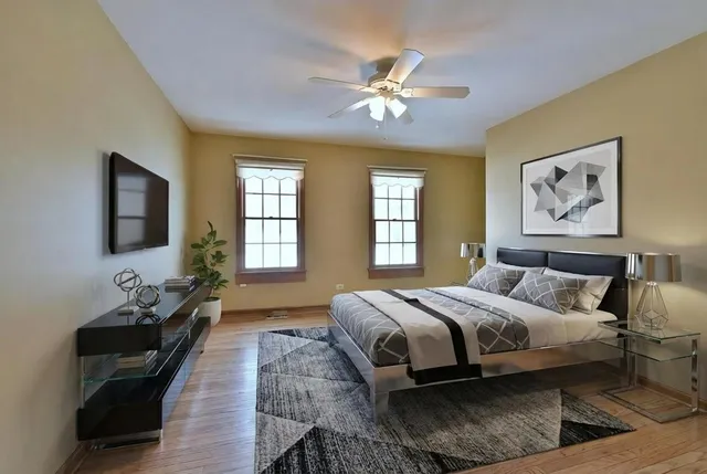 a view of a house with a yard and a deck