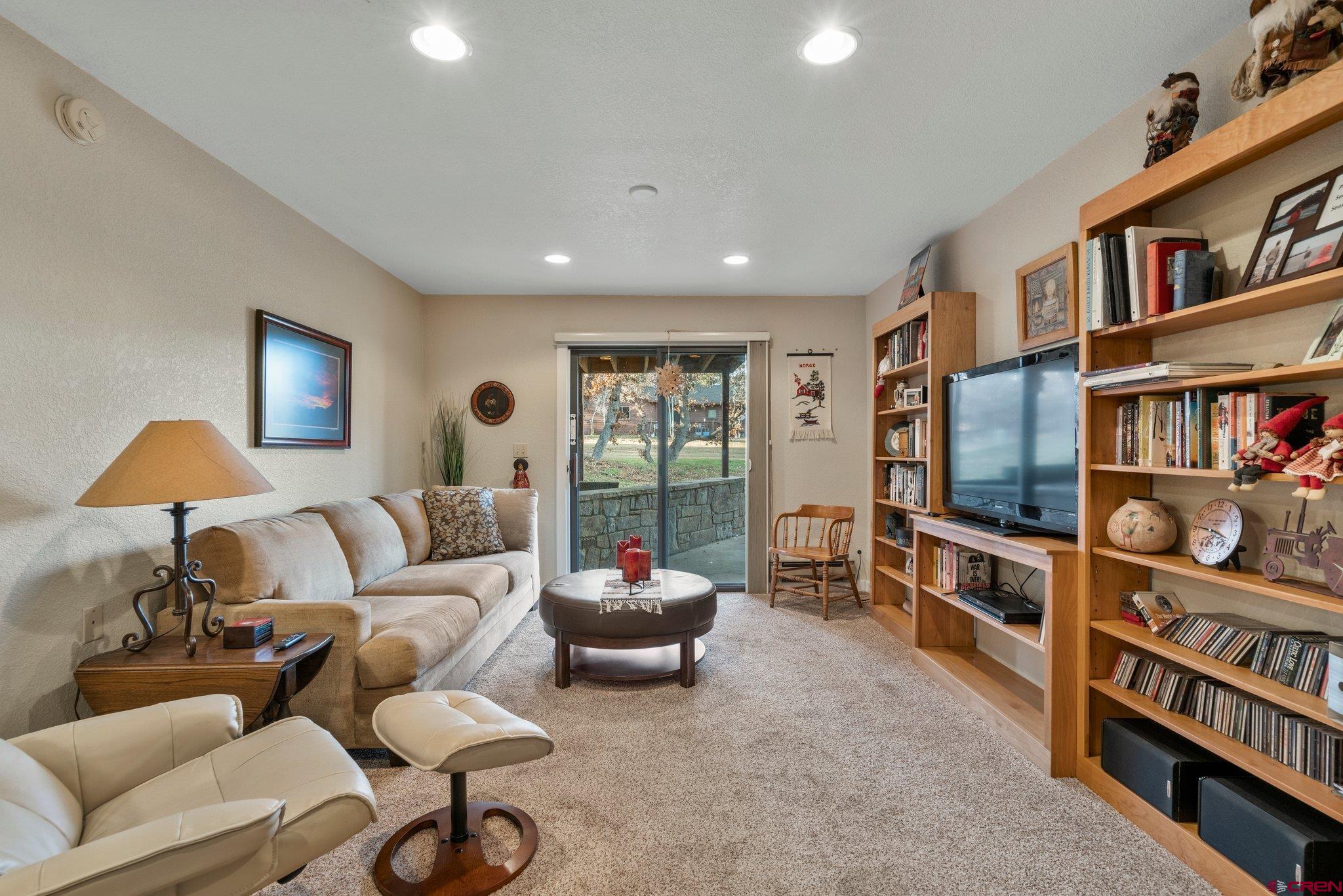 321 Pine Ridge Loop Durango, CO 81301 - Photo 21 of 35 a living room with furniture and a window