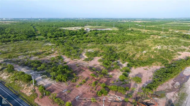 a view of a field with an outdoor space