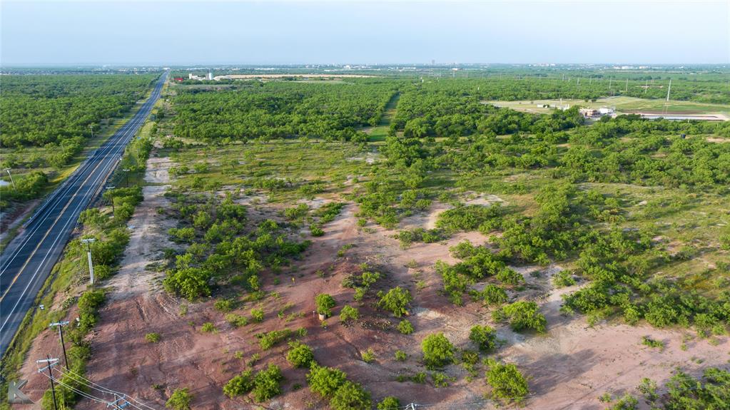 1117 Neas Road Abilene, TX 79601 - Photo 22 of 27 a view of a garden with a lake