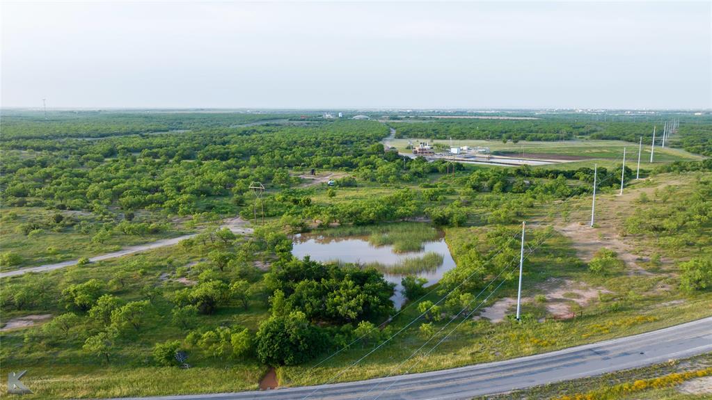 1117 Neas Road Abilene, TX 79601 - Photo 6 of 27 a view of a lake with a city