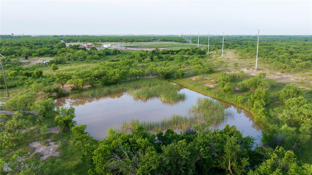 1117 Neas Road Abilene, TX 79601 - Photo 7 of 27 a view of a lake with a yard