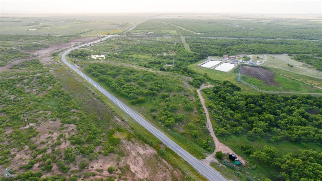 1117 Neas Road Abilene, TX 79601 - Photo 8 of 27 a view of a green field with an outdoor space
