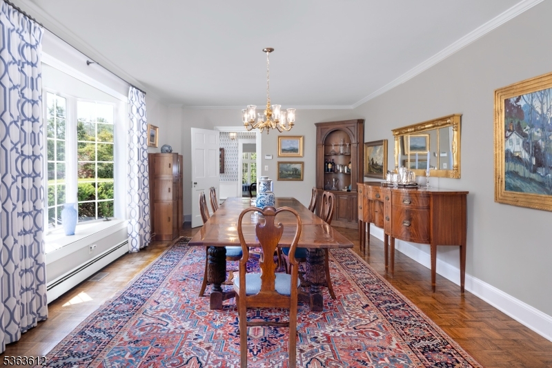 122 Bedens Brook Road Skillman, NJ 08558 - Photo 15 of 47 a view of a dining room with furniture window and wooden floor