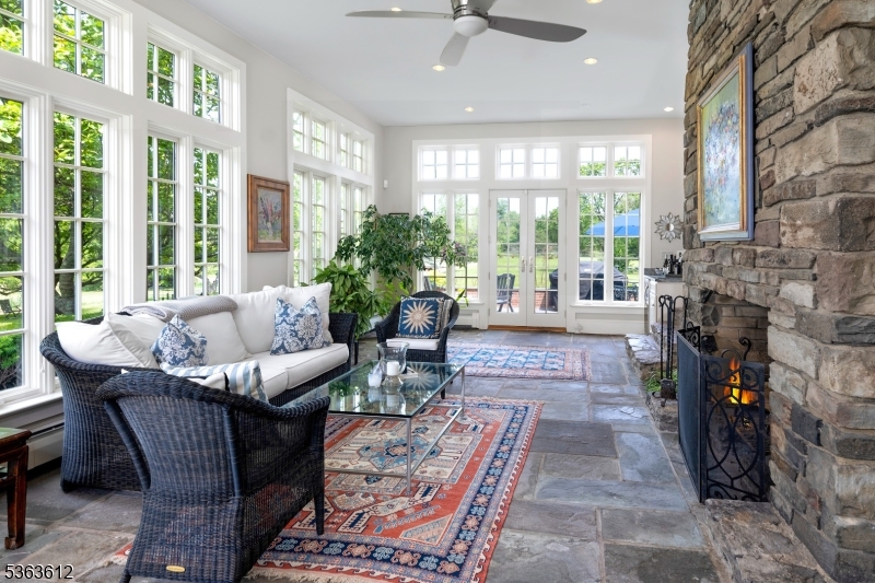 122 Bedens Brook Road Skillman, NJ 08558 - Photo 19 of 47 a living room with fireplace furniture and a large window