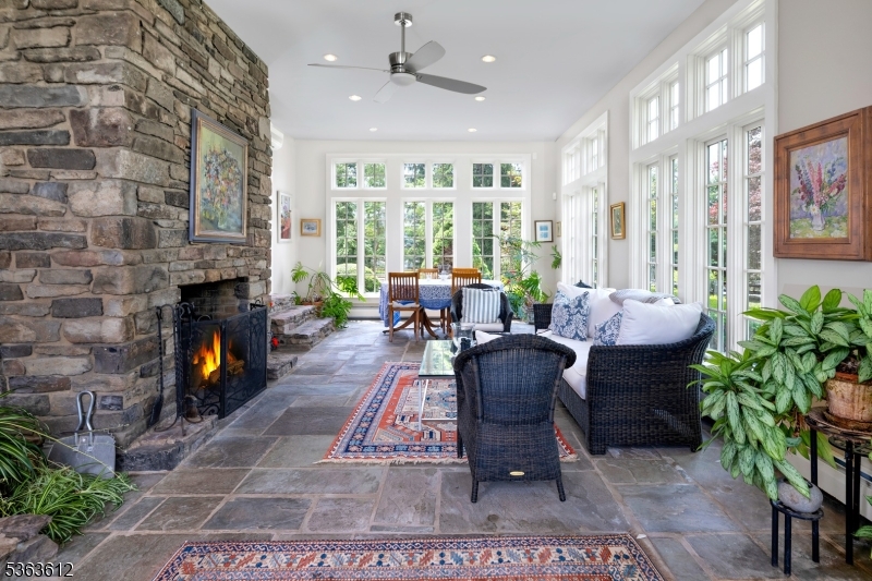 122 Bedens Brook Road Skillman, NJ 08558 - Photo 20 of 47 a living room with furniture large window and a fireplace