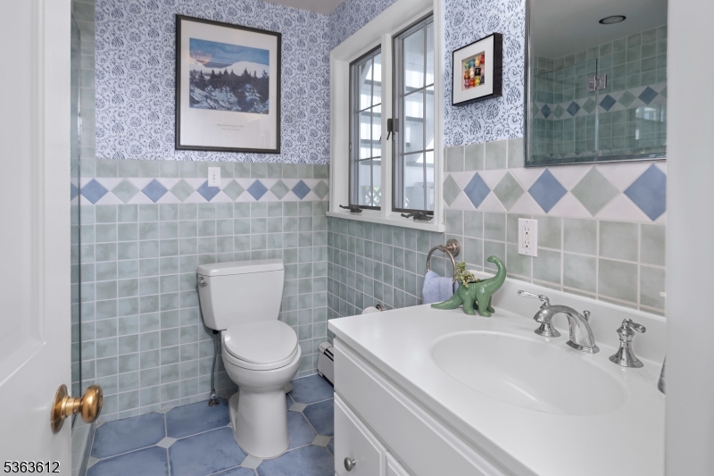 122 Bedens Brook Road Skillman, NJ 08558 - Photo 25 of 47 a bathroom with a toilet sink and mirror