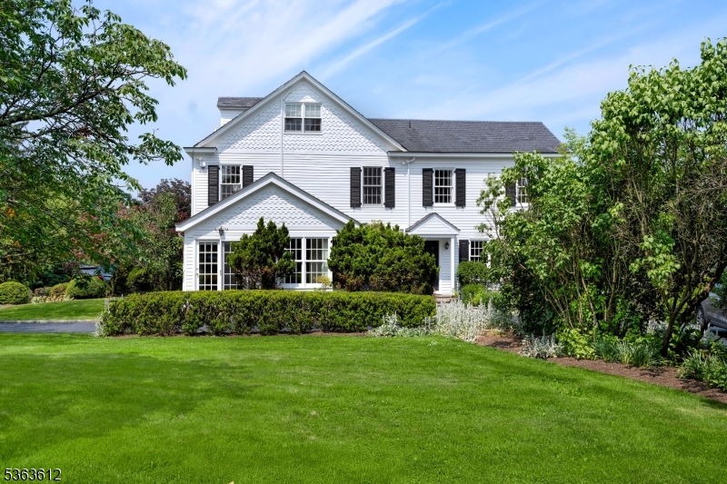 122 Bedens Brook Road Skillman, NJ 08558 - Photo 4 of 47 a front view of a house with a garden